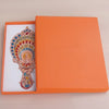 Hand held small mirror with a comb set